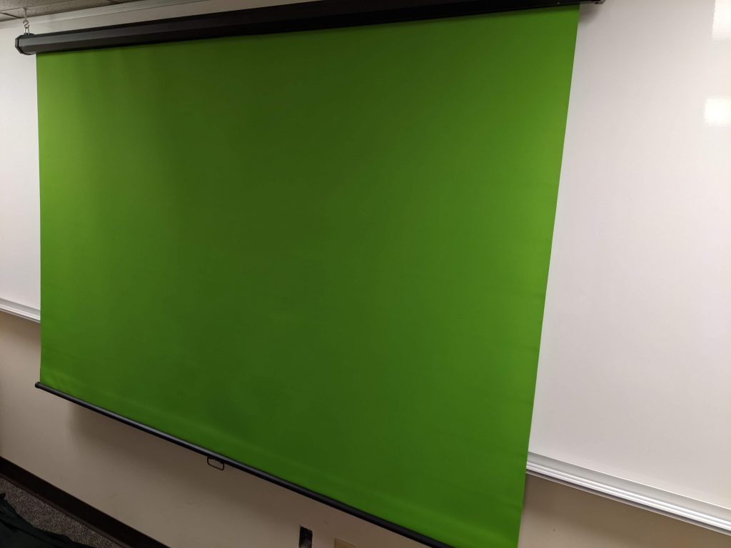 Green screen covering whiteboard